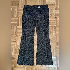 New Simply Vera, bootcut leggings size Medium. Black thin stripe pattern.